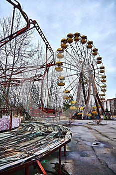 Old ferris wheel in the ghost town of Pripyat. Consequences of the accident at the Chernobil nuclear power plant