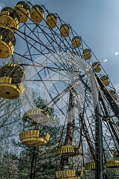 Old ferris wheel in the ghost town of Pripyat. Consequences of the accident at the Chernobil nuclear power plant