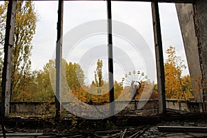 Old ferris wheel in the ghost town of Pripyat. Consequences of the accident at the Chernobil nuclear power plant photo
