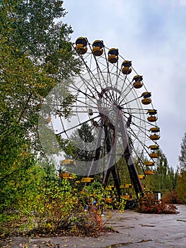 Old ferris wheel in the ghost town of Pripyat. Consequences of the accident at the Chernobyl nuclear power plant