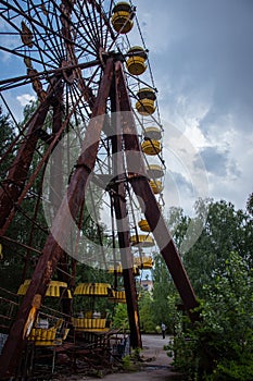 Old ferris wheel in the ghost town of Pripyat. Consequences of the accident at the Chernobyl nuclear power plant.