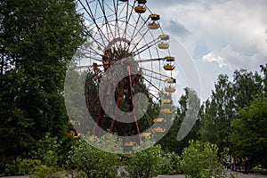Old ferris wheel in the ghost town of Pripyat. Consequences of the accident at the Chernobyl nuclear power plant.