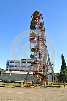 Old ferris wheel in the town of Ochamchira. Abkhazia