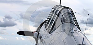 Old fighter american plane cockpit colse up skybound