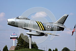 Old fighter jet serves as gate guard