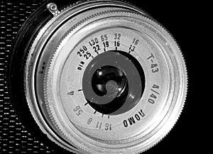 Old film camera on black and white closeup picture