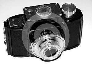 Old film camera on black and white closeup picture