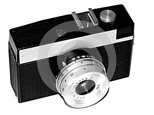 Old film camera on black and white closeup picture