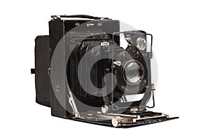 Old film camera isolated on white