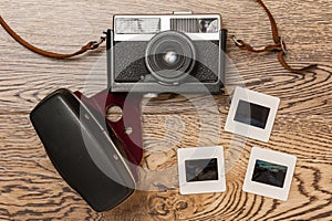 Old film camera and slides