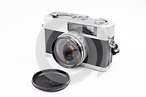 Old film camera on a white background