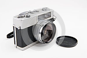 Old film camera on a white background