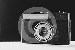 Old film camera. White background close-up.