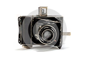 Old film photo camera on white background