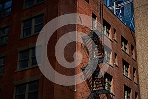 Old fire escape on an old brick wall. American vintage style