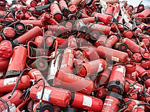 Old fire extinguishers are collected for recycling and disposal