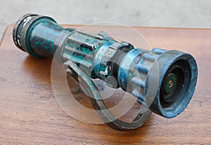 Old Fire Protection Equipment on Wooden Table