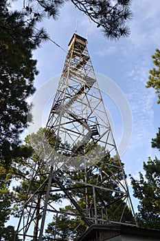 Old fire tower in forest