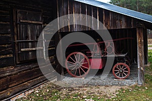 Old fire truck in an old house. Background. Beautiful landscape. Background.