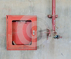 Old firehose and firehose box photo