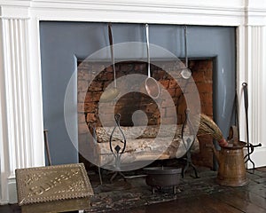 Old fireplace with logs