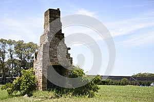 Old fireplace in paddock left standing as a solitary