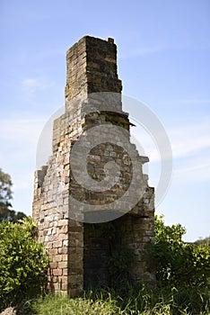 Old fireplace in paddock left standing as a solitary