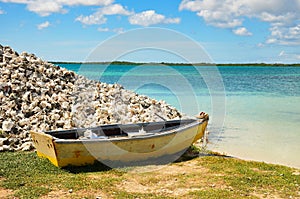 old fisher ship on beautiful beach on the caribbean island of bonaire. Netherlands Antilles. blue ocean, travel