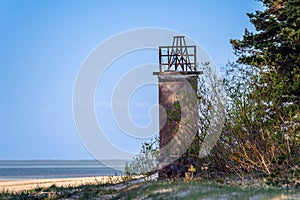 The old fishermen\'s lighthouse on Ragaciema beach, built in 1875, destroyed during the war