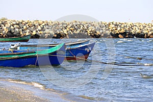 Old fishing blue boat on the black sea, Navodari Romania