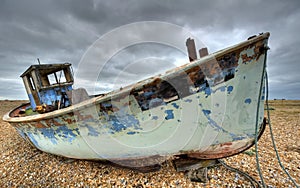 Old fishing boat abondond and rotting