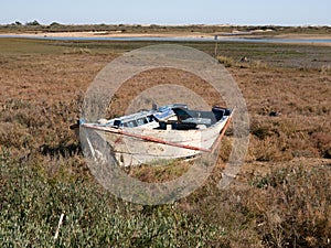 Old fishing boat in the Algarve dunes