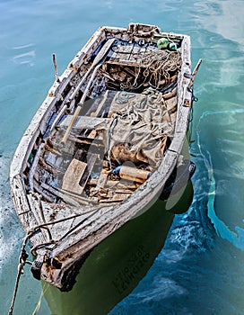 Old fishing boat moored in the harbor