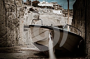 Old fishing boat on the pier