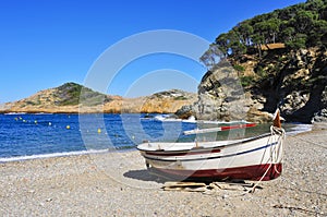 Old fishing boat in Sa Tuna beach in Begur, Spain photo