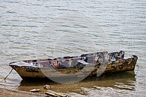 Old fishing boat on the shores of Golfito, Costa Rica. photo