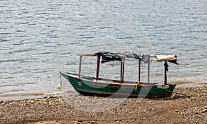 Old fishing boat on the shores of Golfito, Costa Rica. photo