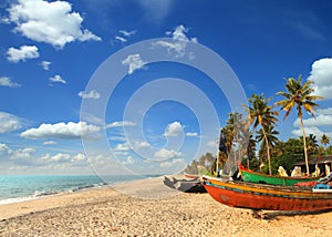 Old fishing boats on beach in india