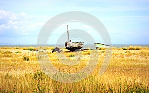 Old fishing boats Lydd-on-Sea beach England