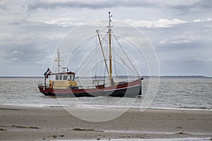 Old fishing cutter in the Netherlands photo