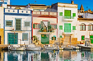 Old fishing harbor village with colorful buildings of Portocolom, Majorca island