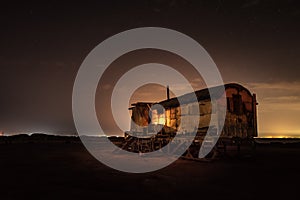 Old fishing hut in the night