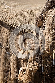 Old fishing net in the harbor with cork floats