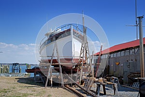 Old Fishing trawler being restored in old boat yard