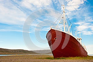 Old fishing vessel shipwrecked in the Westfjords region, Iceland