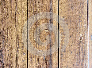 old flaked peeled weathered light yellow gray brown paint wood curve mouldering board planks background texture