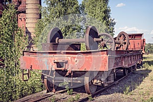 Old flat wagon with railcar wheelset