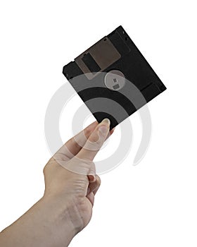 An old floppy disk in the female hand