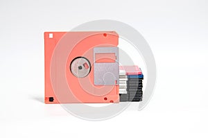 Old floppy disk put on white background.