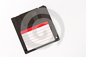 Old floppy diskette on white background